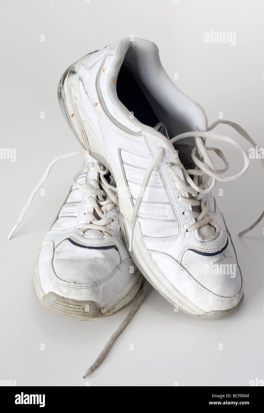 A pair of white tennis shoes Stock Photo