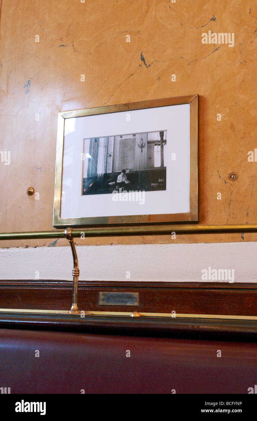 Photograph of Simone de Beauvoir on wall of Les Deux Magots Cafe Paris France Stock Photo