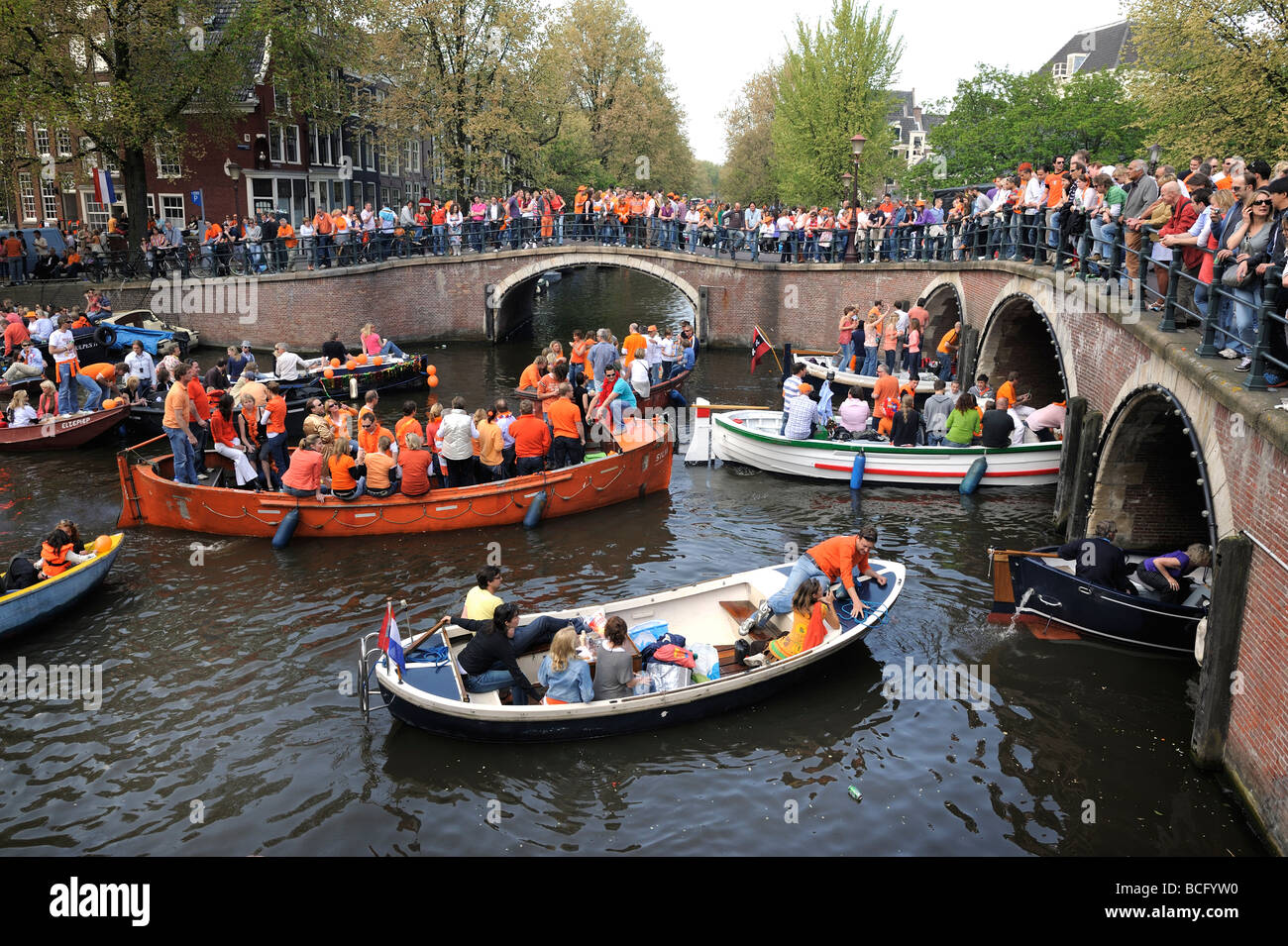 The Prinsengracht full with party boats for the 2009 Queens Birthday celebration Stock Photo