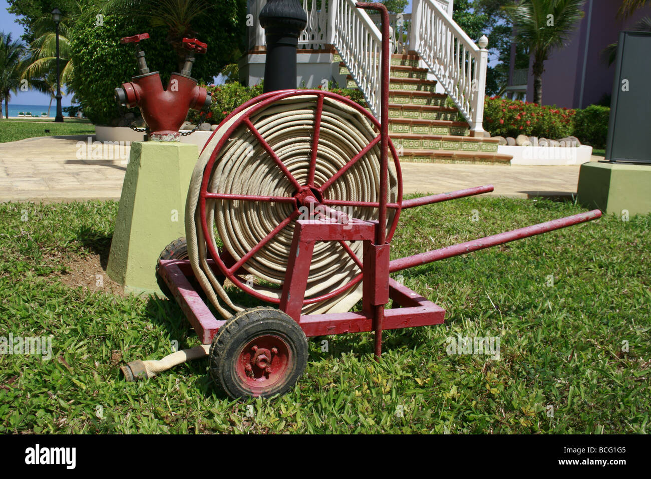 Fire hose in the grounds of hotel in Negril, Jamaica Stock Photo Alamy