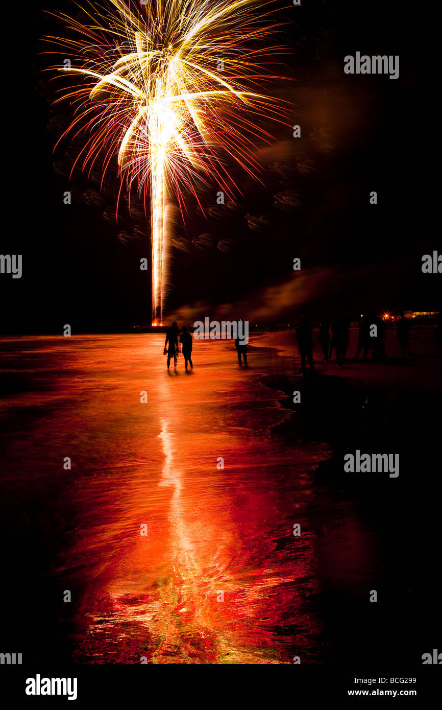 Fireworks explode along the beach at Isle of Palms SC marking