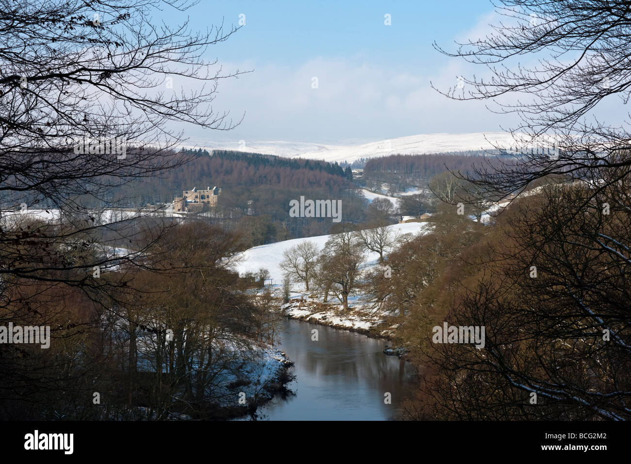 The River Wharfe and Barden Tower from Strid Woods, Yorkshire UK Stock Photo