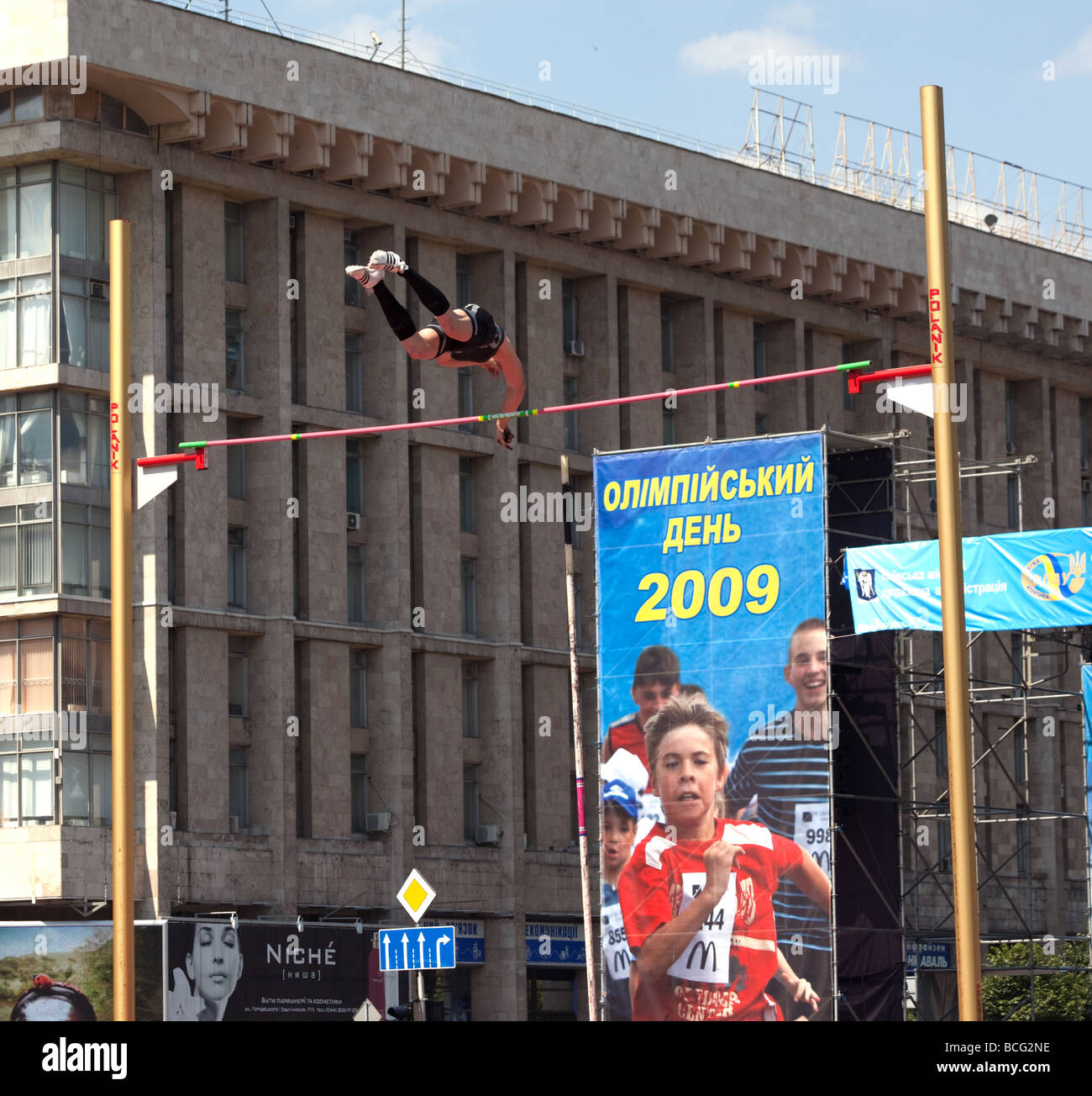 A pole vaulting competition taking place in Independence Square in Kiev