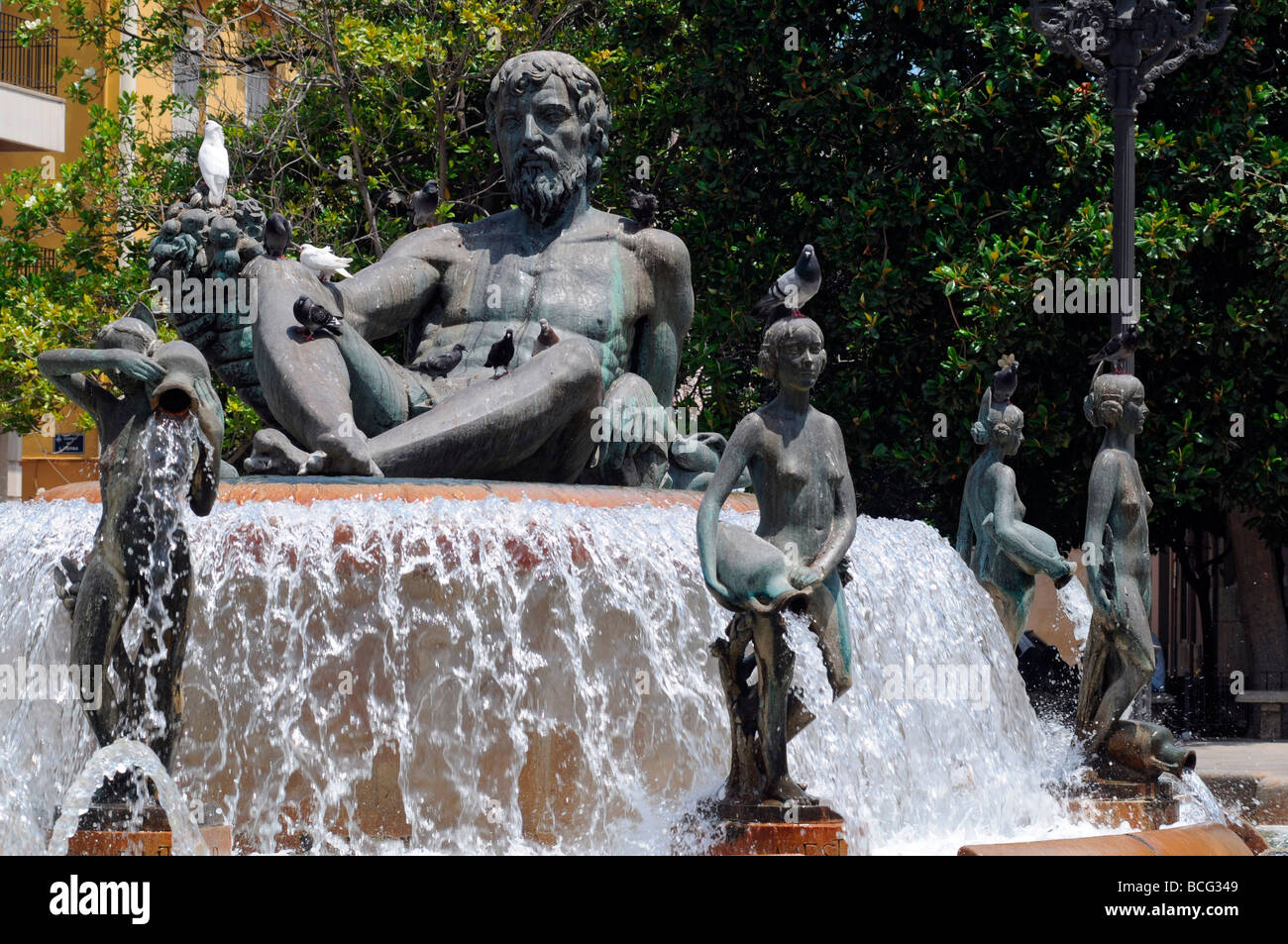 Turia Fountain In The Square In The Plaza De La Virgen In The Old