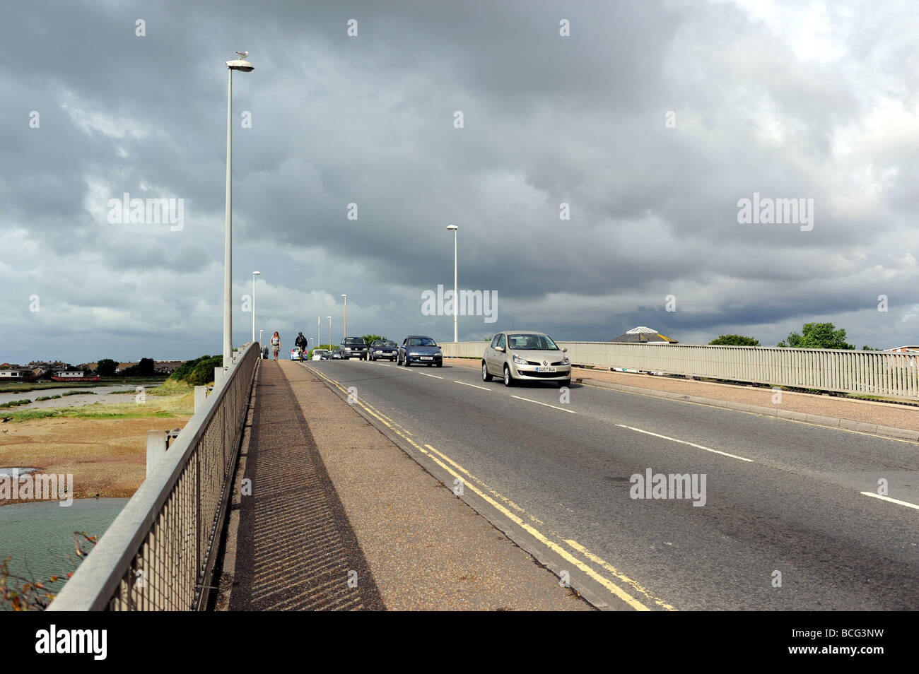 Traffic crossing the River Adur on the Norfolk Bridge at Shoreham by sea in Sussex UK Stock Photo