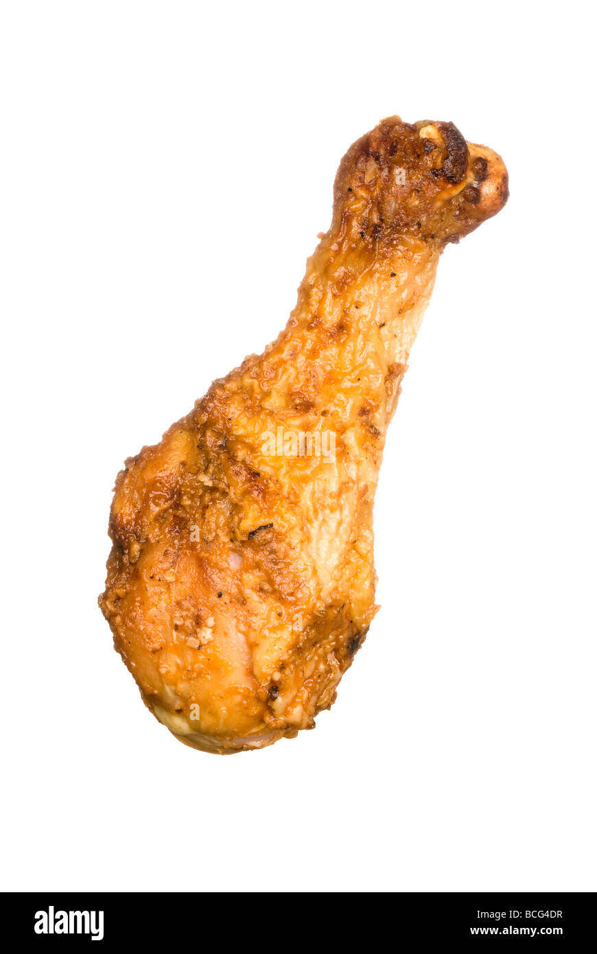 A barbecued chicken drum leg isolated on a white background Stock Photo