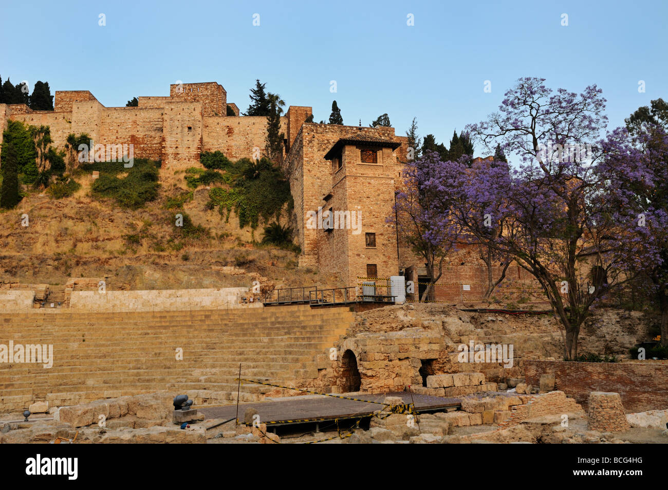 Walls of Alcazaba with ruins of Roman theater below n Malaga Costa del Sol Andalucia Spain Stock Photo