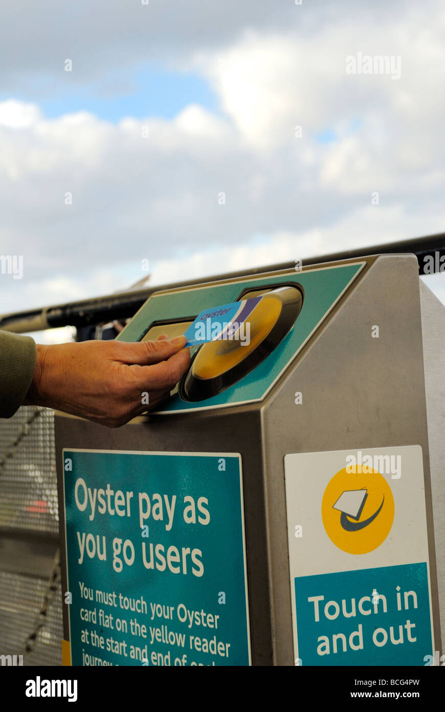 Reading Oyster travel card on touch sensor London UK Stock Photo