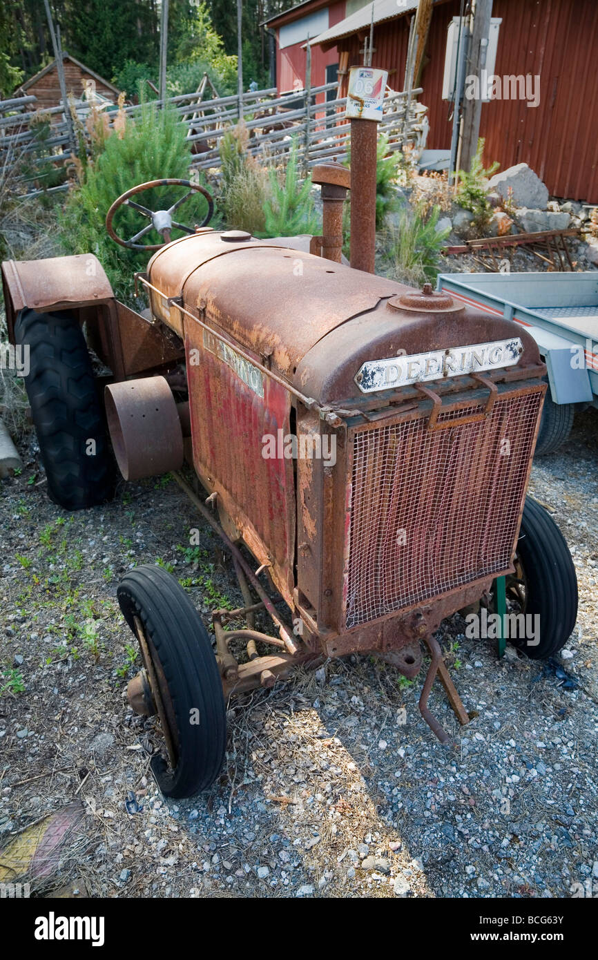 Rusty Vintage Deering tractor in Sweden Stock Photo
