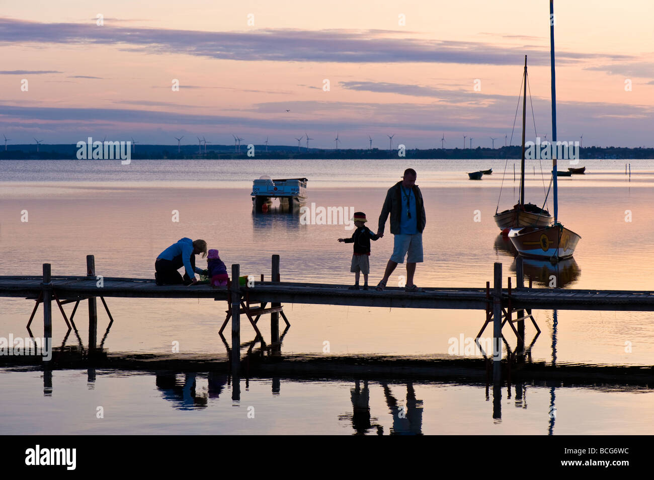 Wooden pier overlooking Puck Bay early evening Hel Peninsula Baltic Sea Poland Stock Photo