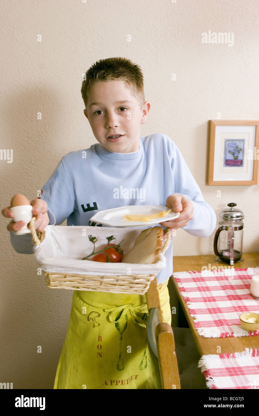Young boy clean the table - Stock Photo