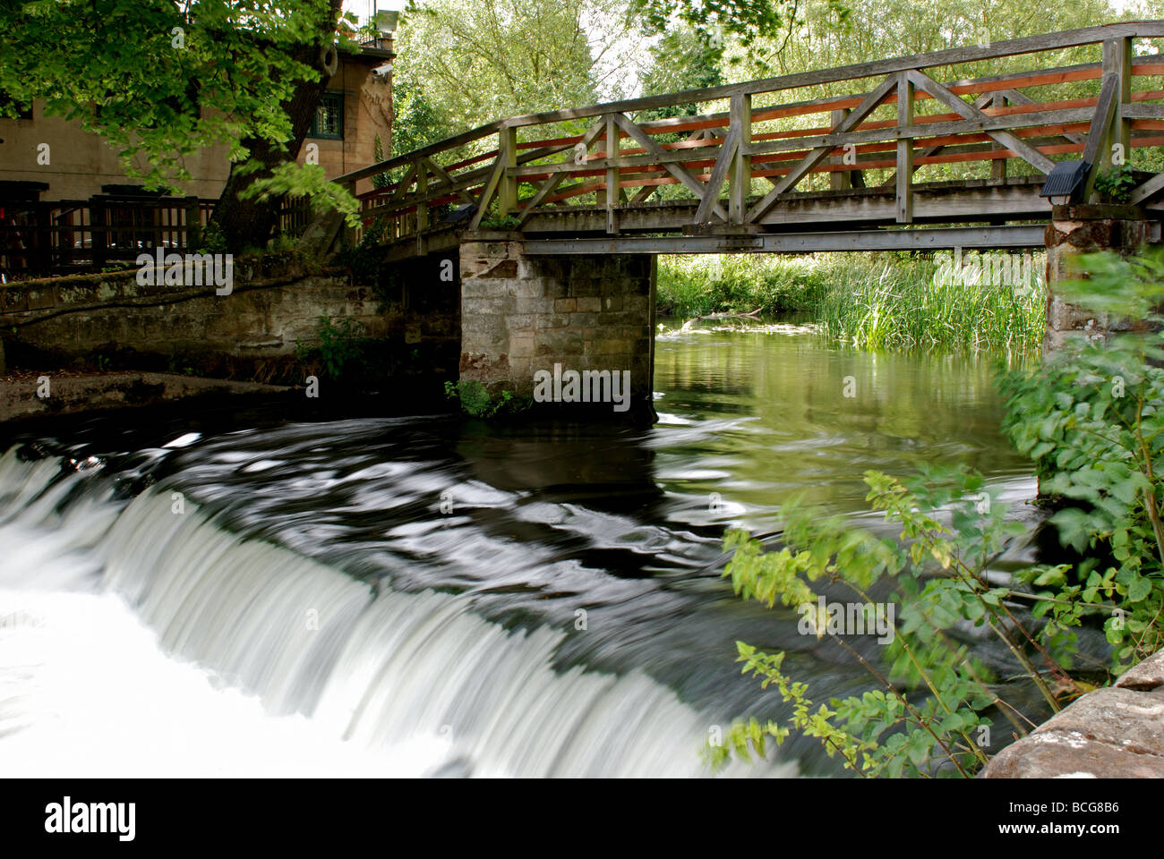 River Avon weir at the Saxon Mill, Warwick, Warwickshire, England, UK