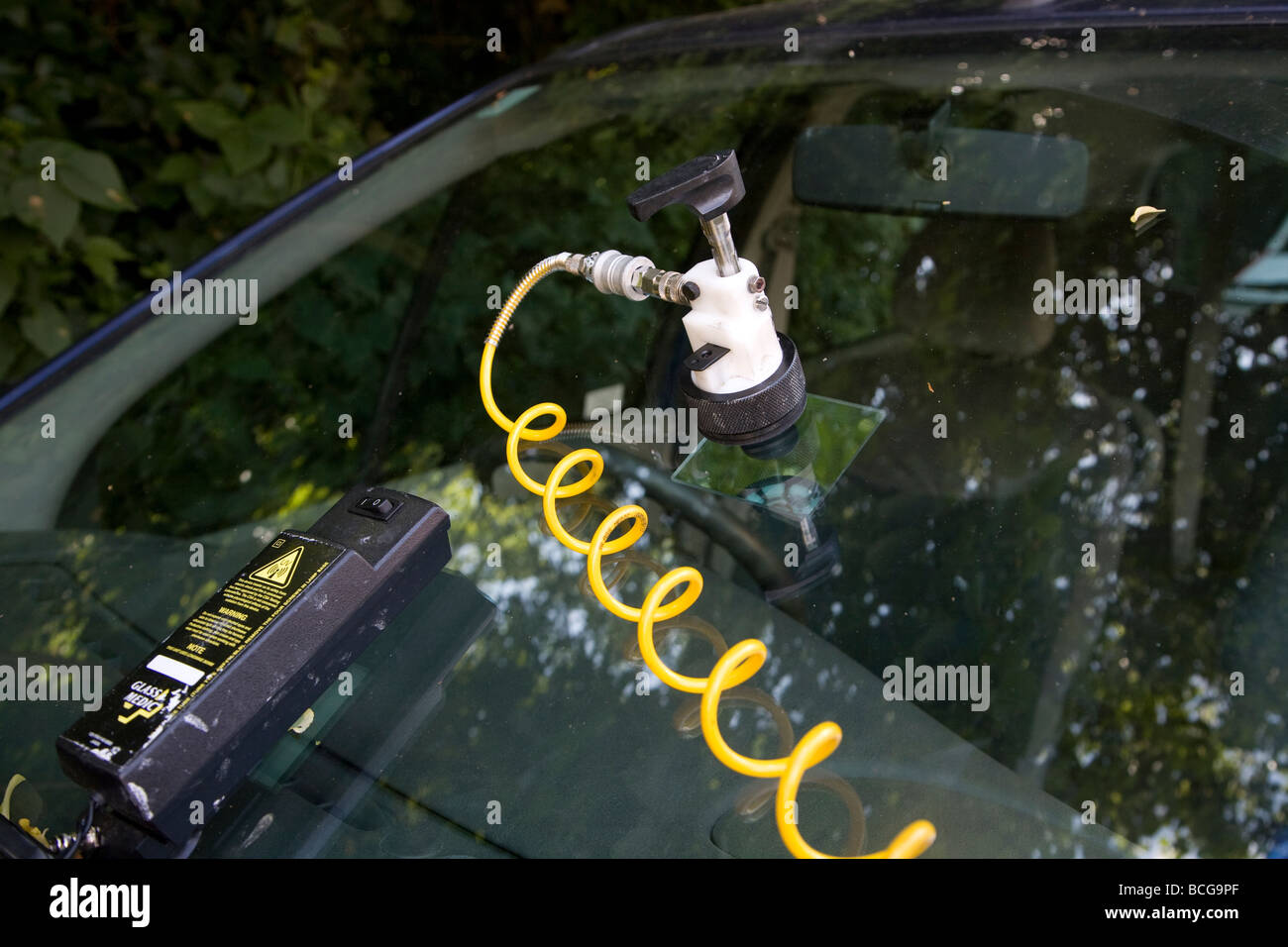 Car windscreen repair Stock Photo - Alamy