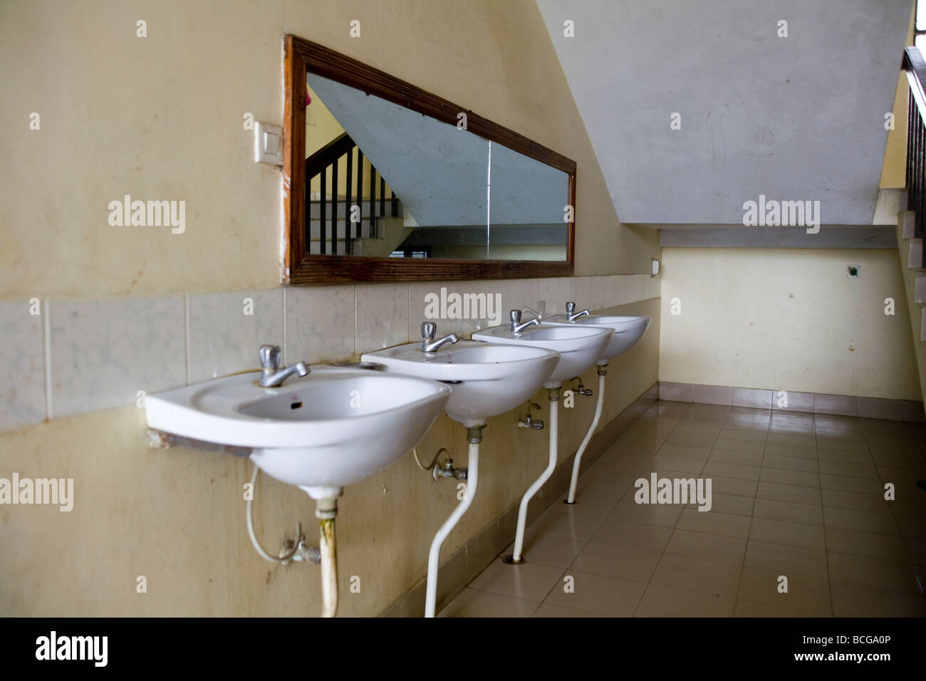 Four sinks along a wall Stock Photo