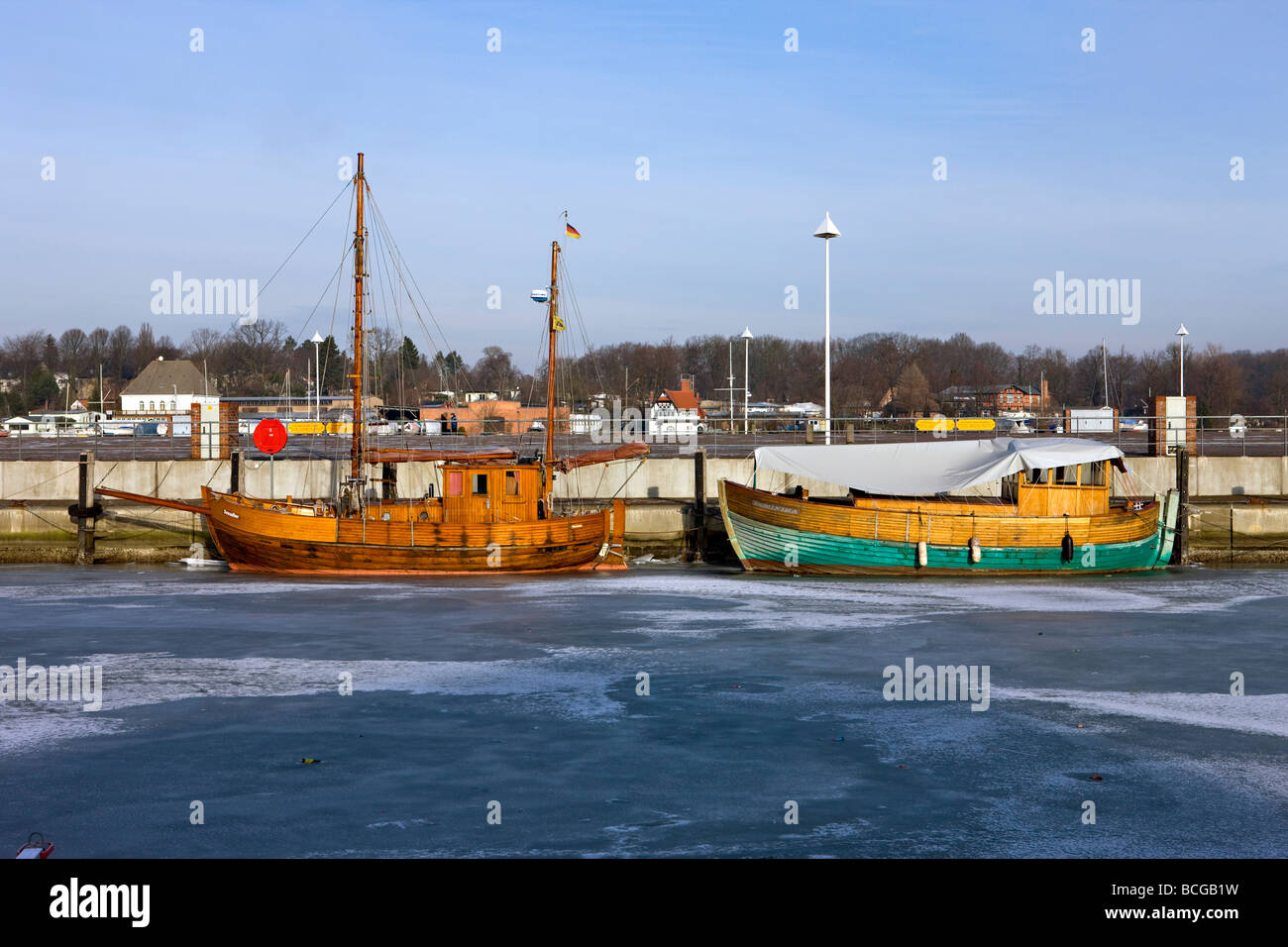 Yachts in ice, Rostock Stock Photo Alamy