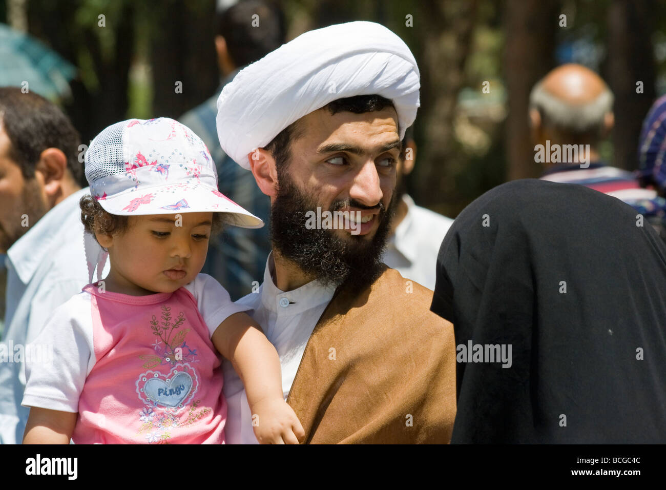 Muslim Cleric and his family in Qom Iran Stock Photo