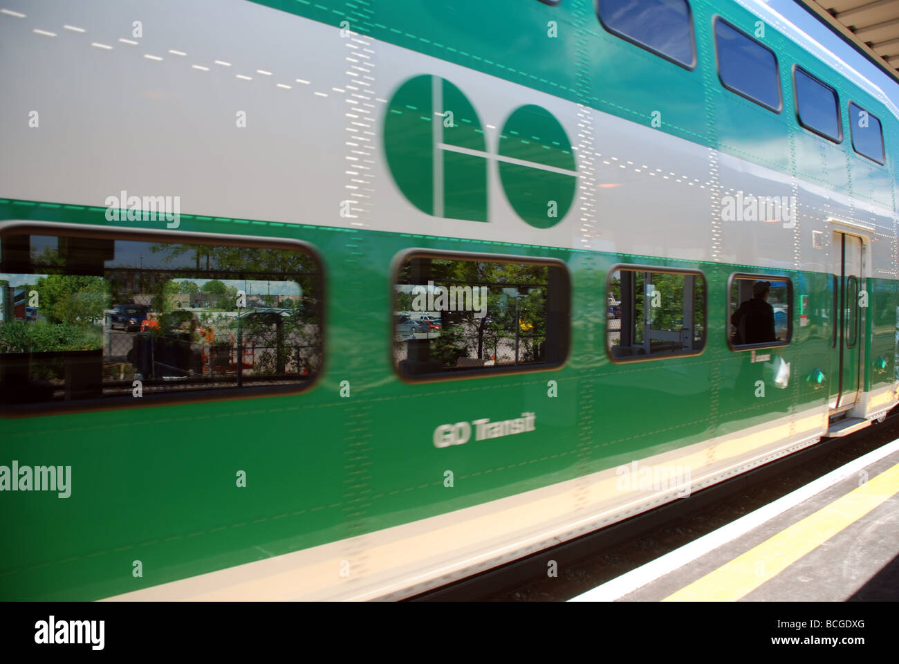 GO transit commuter train in motion Stock Photo