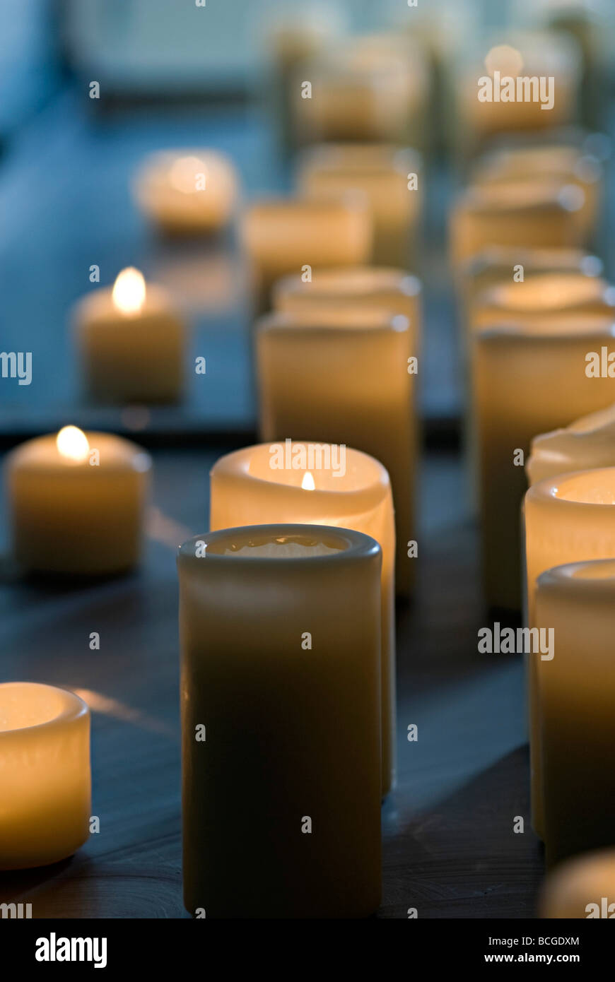 images of candles in churches in which a prayer is made and a candle