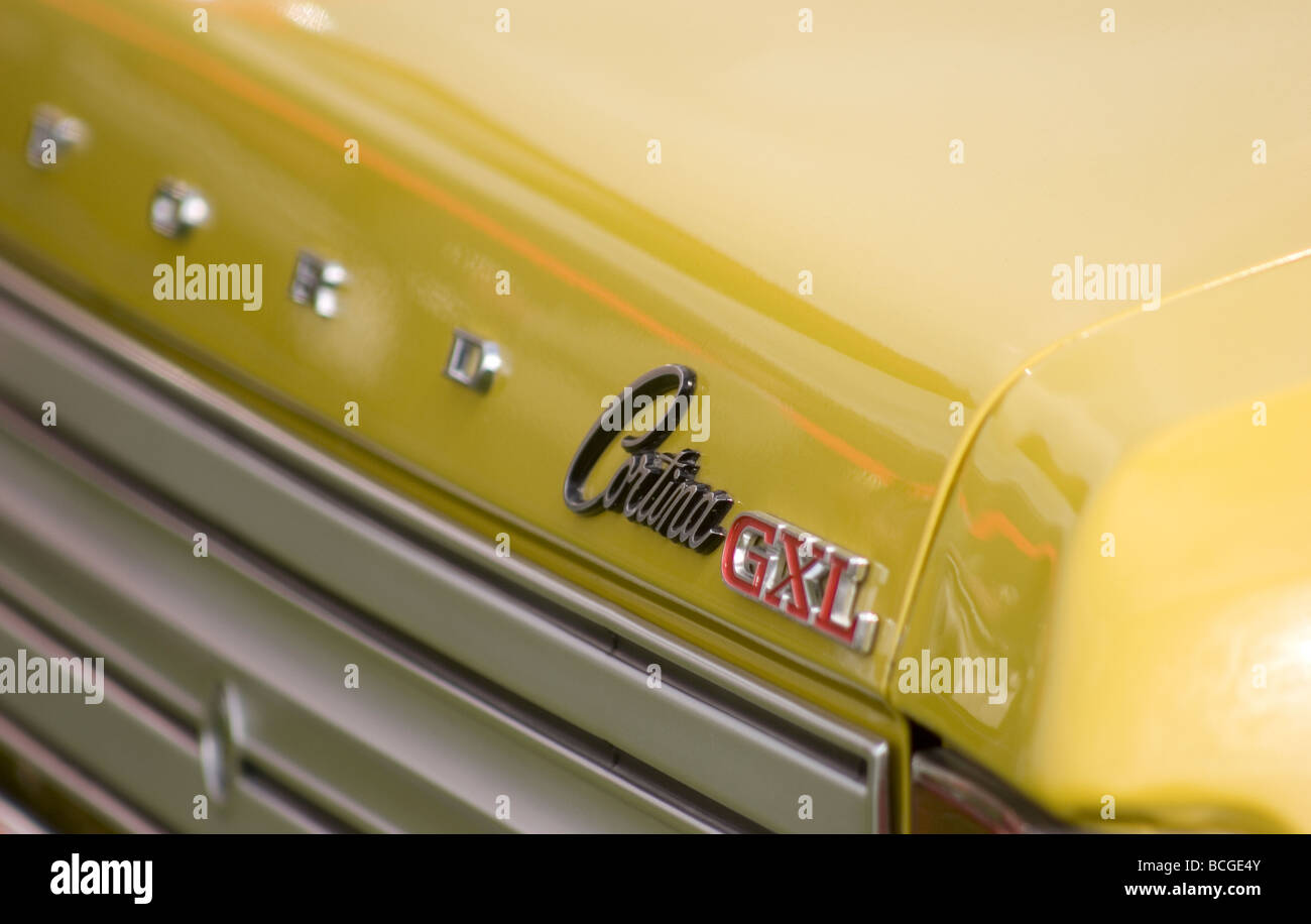 The rear boot emblems of a Cortina GXL ford yellow Mk3 mark three Stock  Photo - Alamy