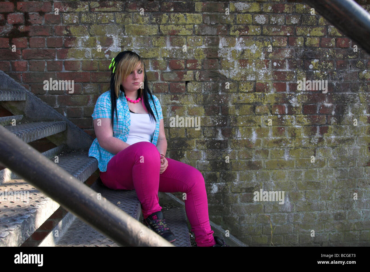 Goth Emo Girl Hanging Around Sitting on a Metal Staircase Stock Photo