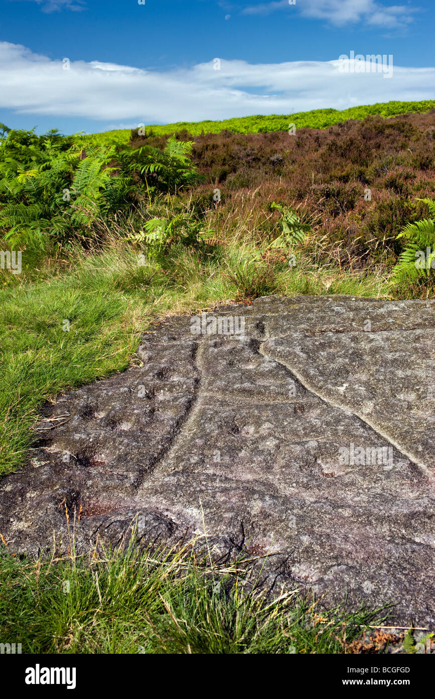 Prehistoric rock carvings on Ilkley Moor, Yorkshire UK Stock Photo