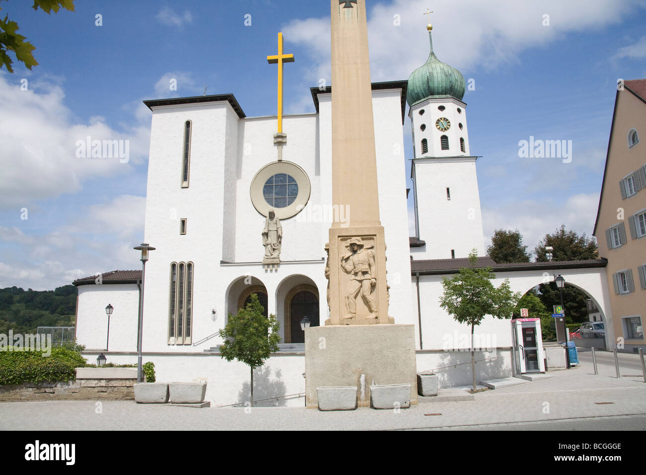 Stockach Baden Wurttenburg Germany EU War memorial in front of an impressive church Stock Photo