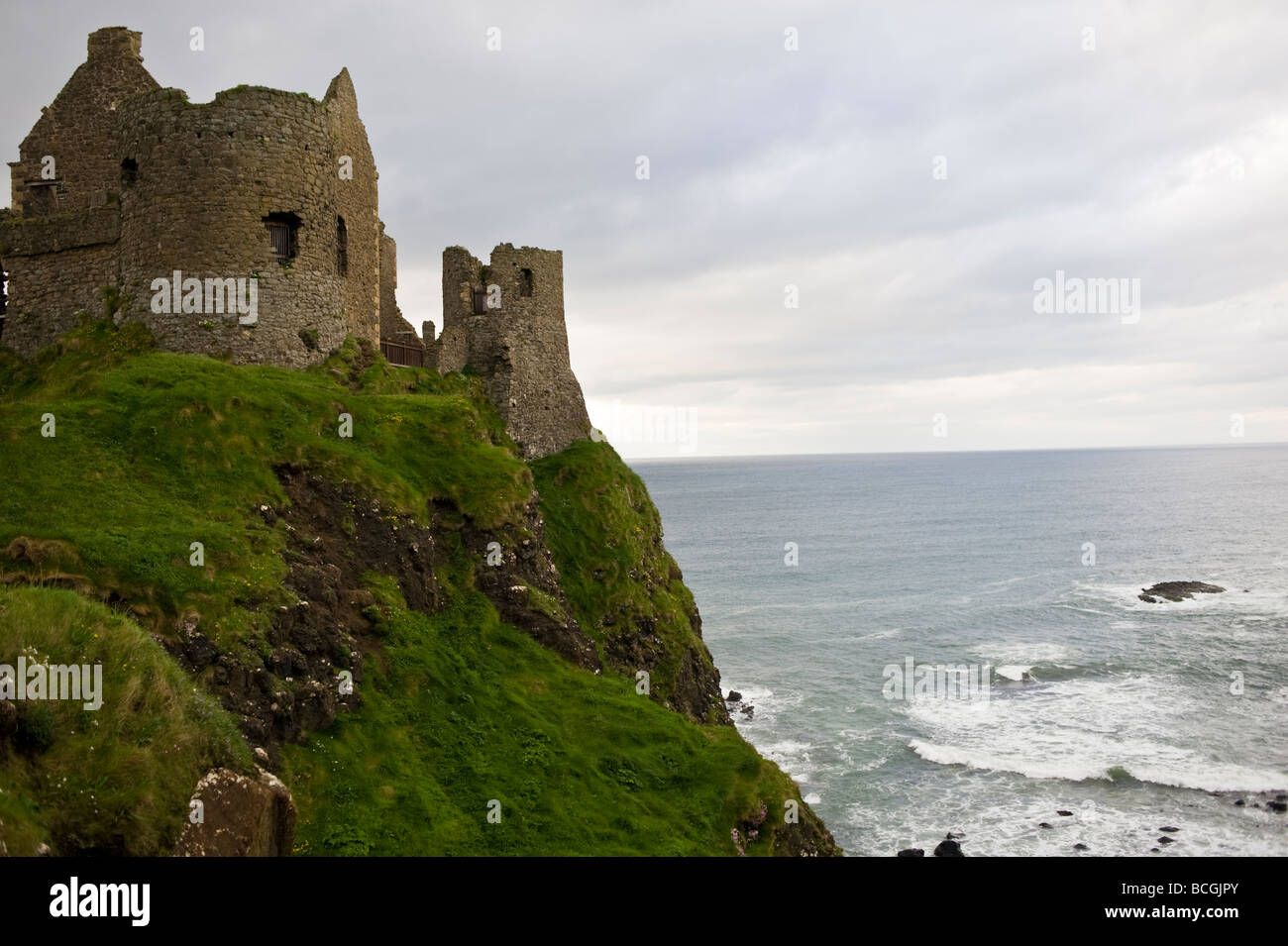 Dunluce castle and cliffs in County Antrim in Northern Ireland Stock Photo