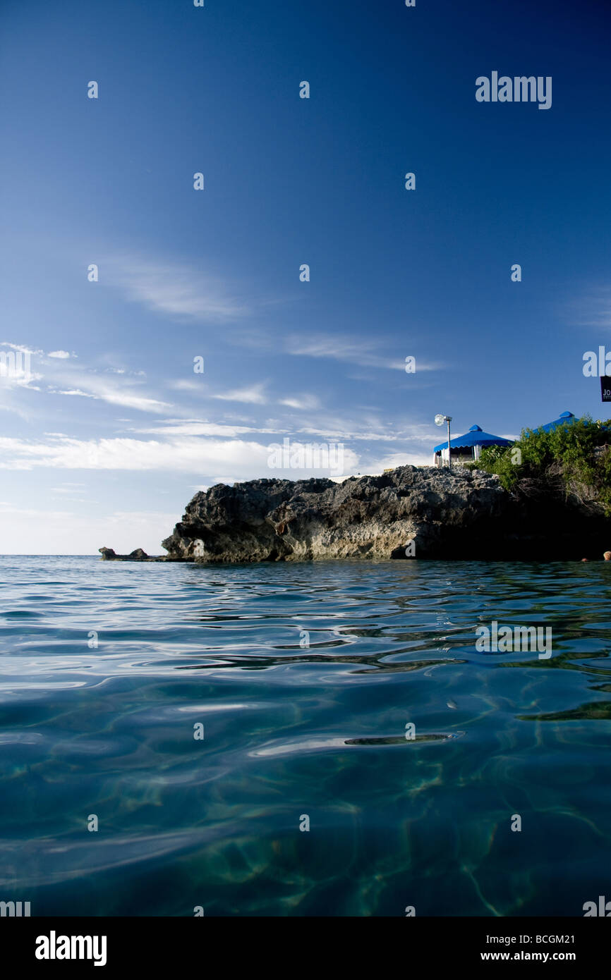 A gazebo looks out over the rippled, deep blue waters of the Atlantic ocean near Sosua, Dominican Republic Stock Photo