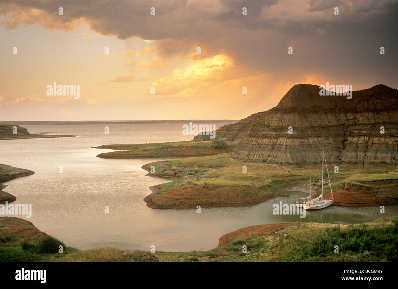 Sailboats in small cove at sunset on Lake Sakakawea North Dakota BEAN ALPix 0091 Stock Photo