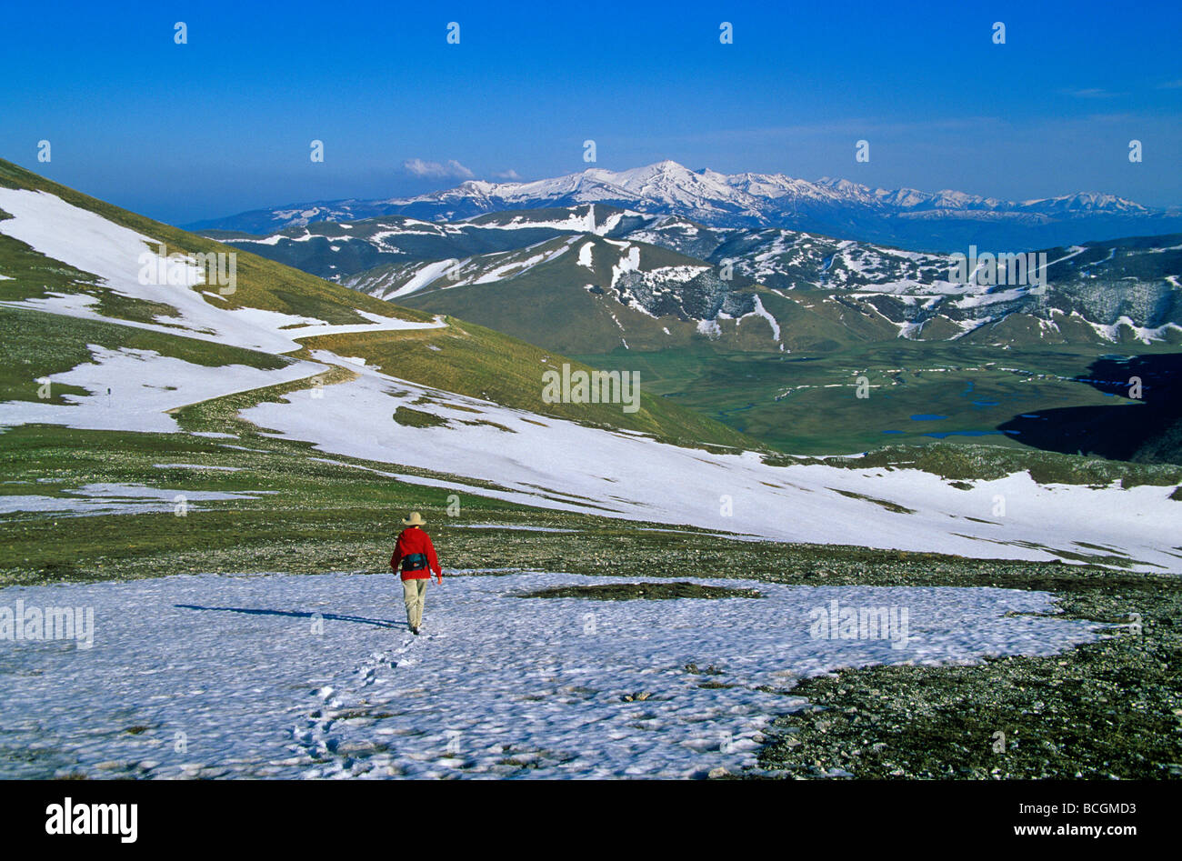Walking in mountains above Castelluccio in Monti Sibillini National Park northeast of Norcia Umbria Italy BEAN ALPix 0094 Stock Photo