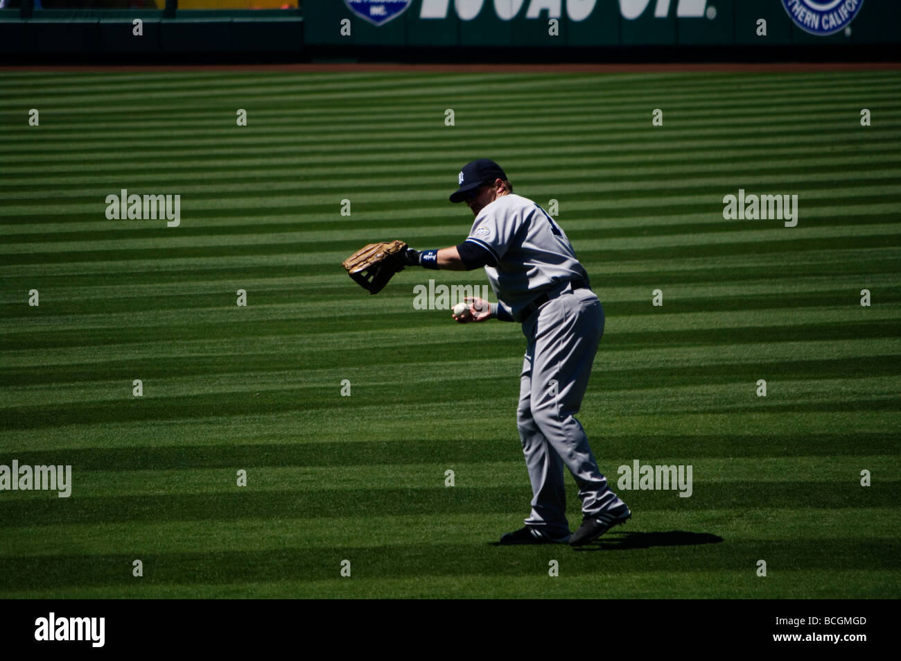 Erik Hinske warms up in right field between innings at an Anaheim/Yankees game. Stock Photo