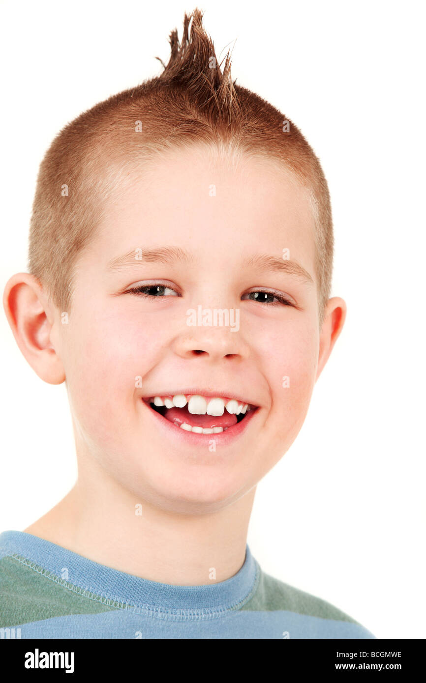 Portrait of young happy boy with mohawk, studio shot Stock Photo
