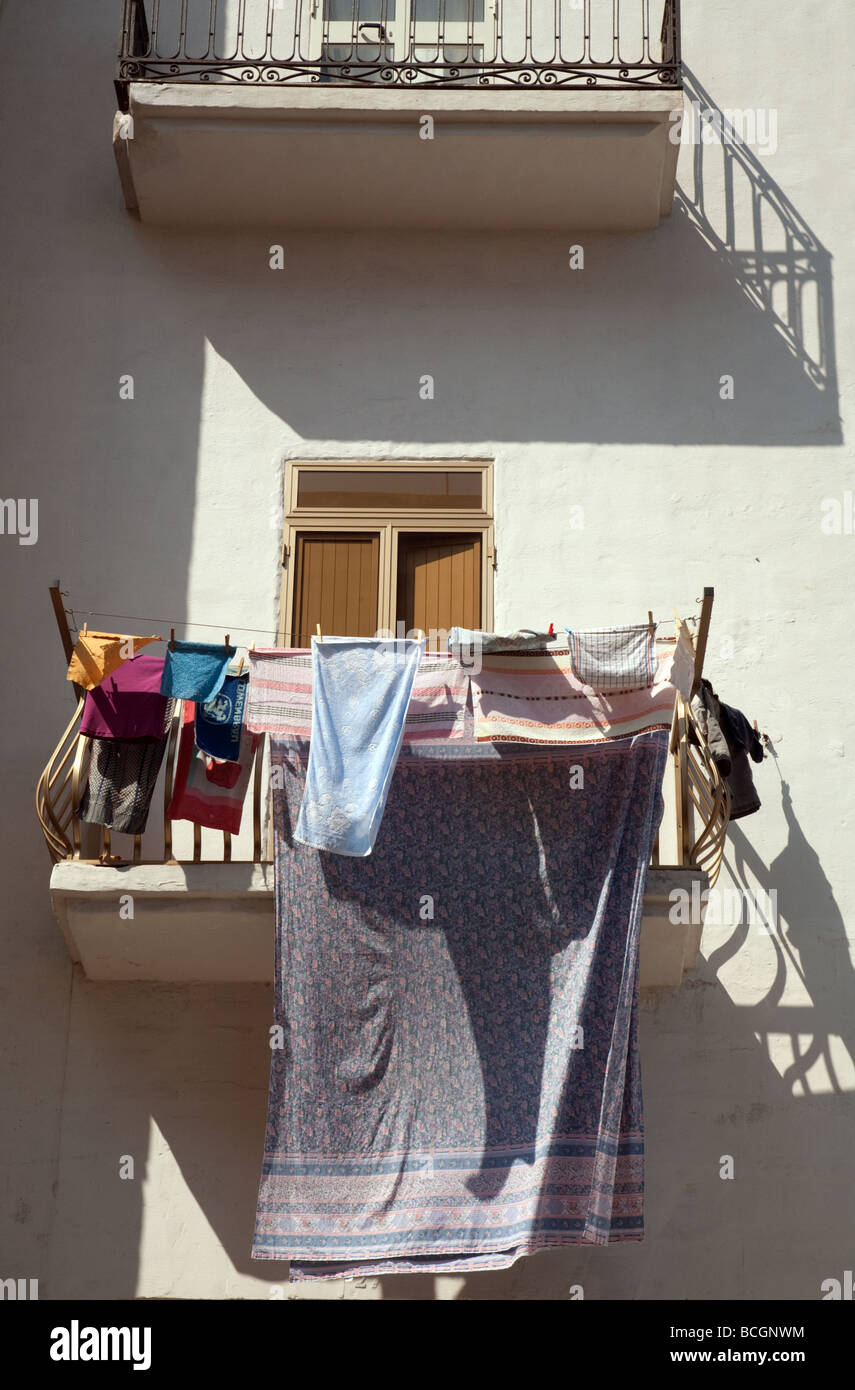 Clothes hanging from balcony hires stock photography and images Alamy