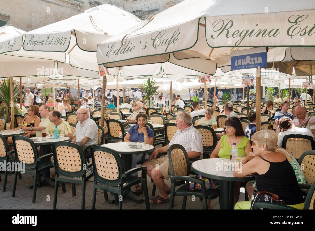 Tourists eating alfresco in Republic Square, Valletta Malta Stock Photo