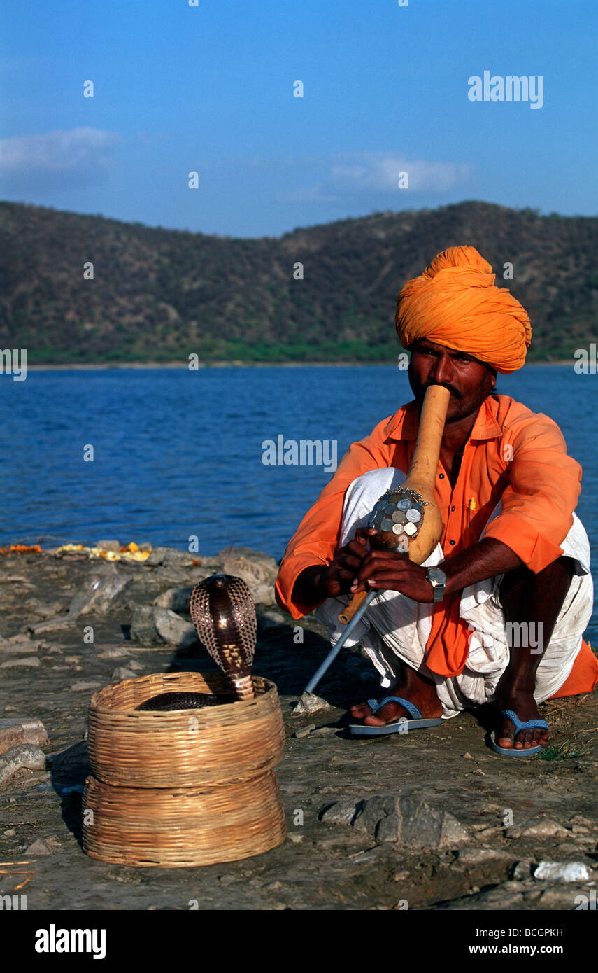 India Rajasthan Jaipur Jal Mahal Lake Palace snake charmer Stock Photo