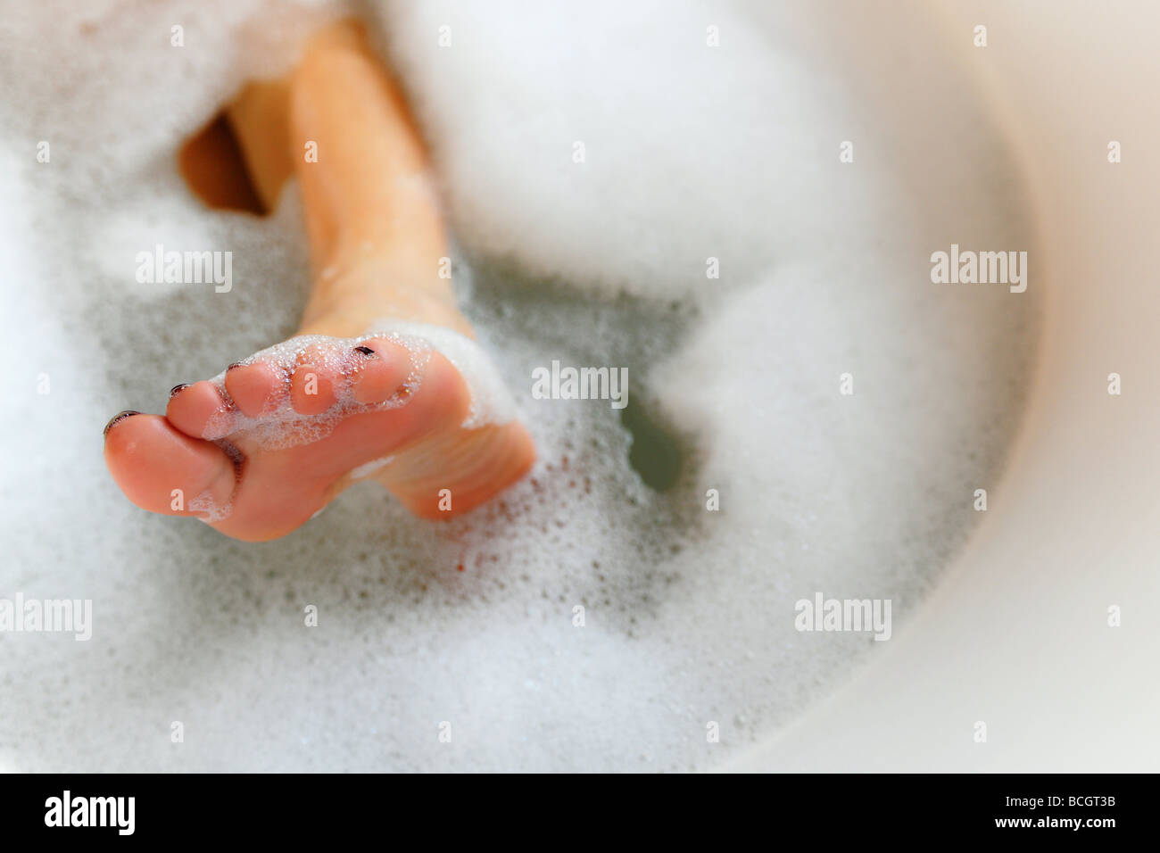 womans foot in bubble bath Stock Photo - Alamy