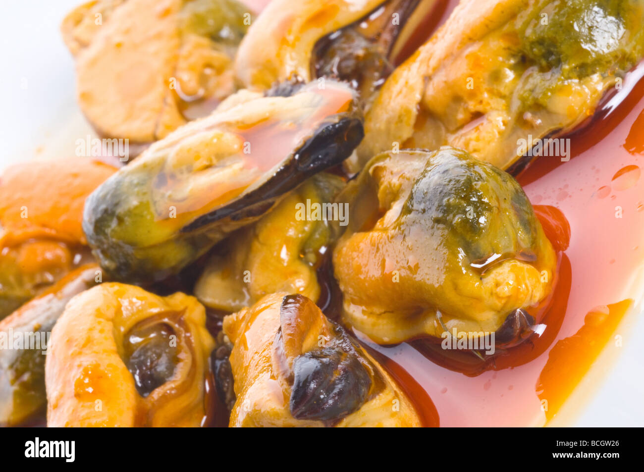 Mussels in red sauce Stock Photo Alamy