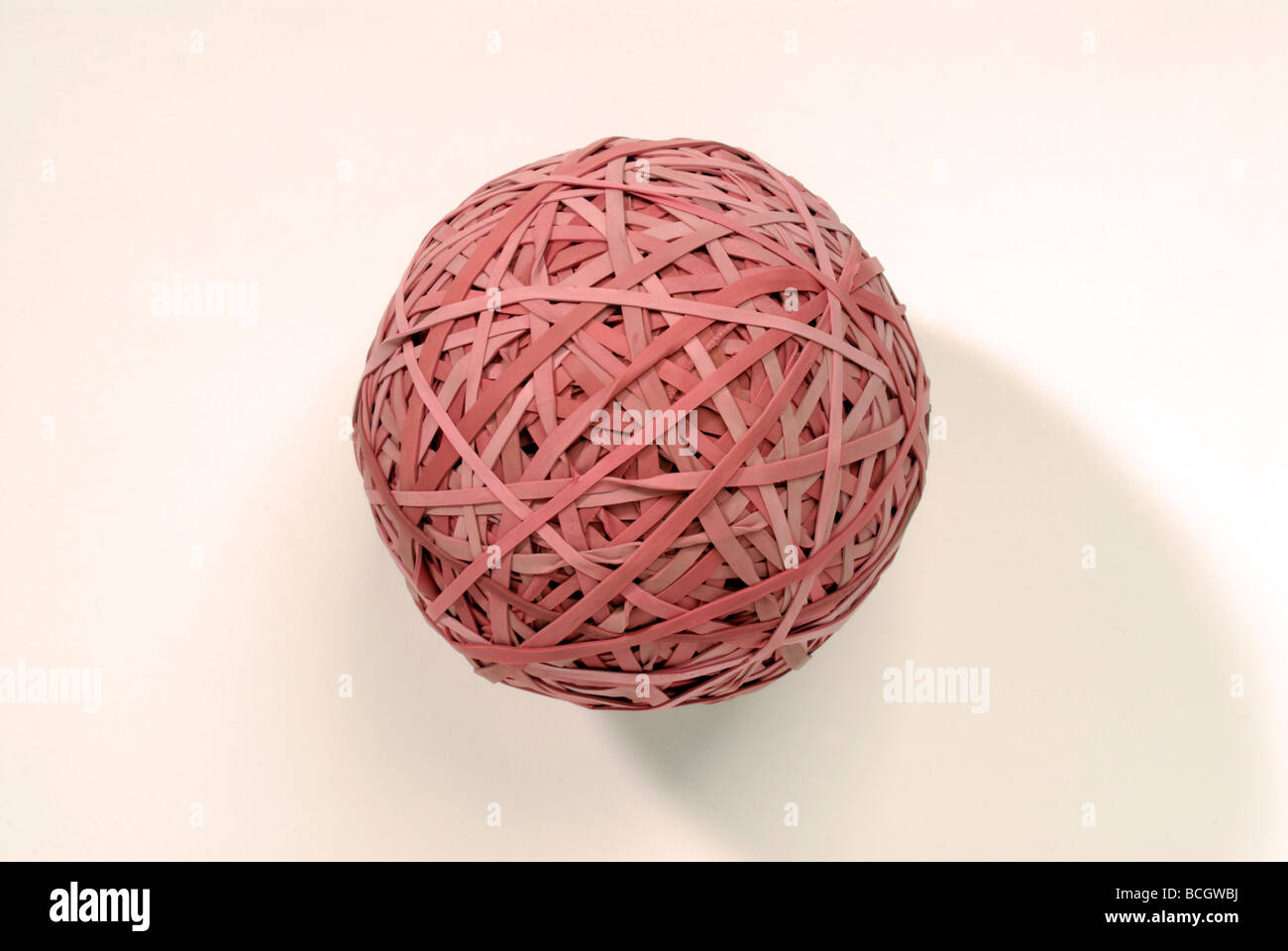 Rubber band ball on white Stock Photo