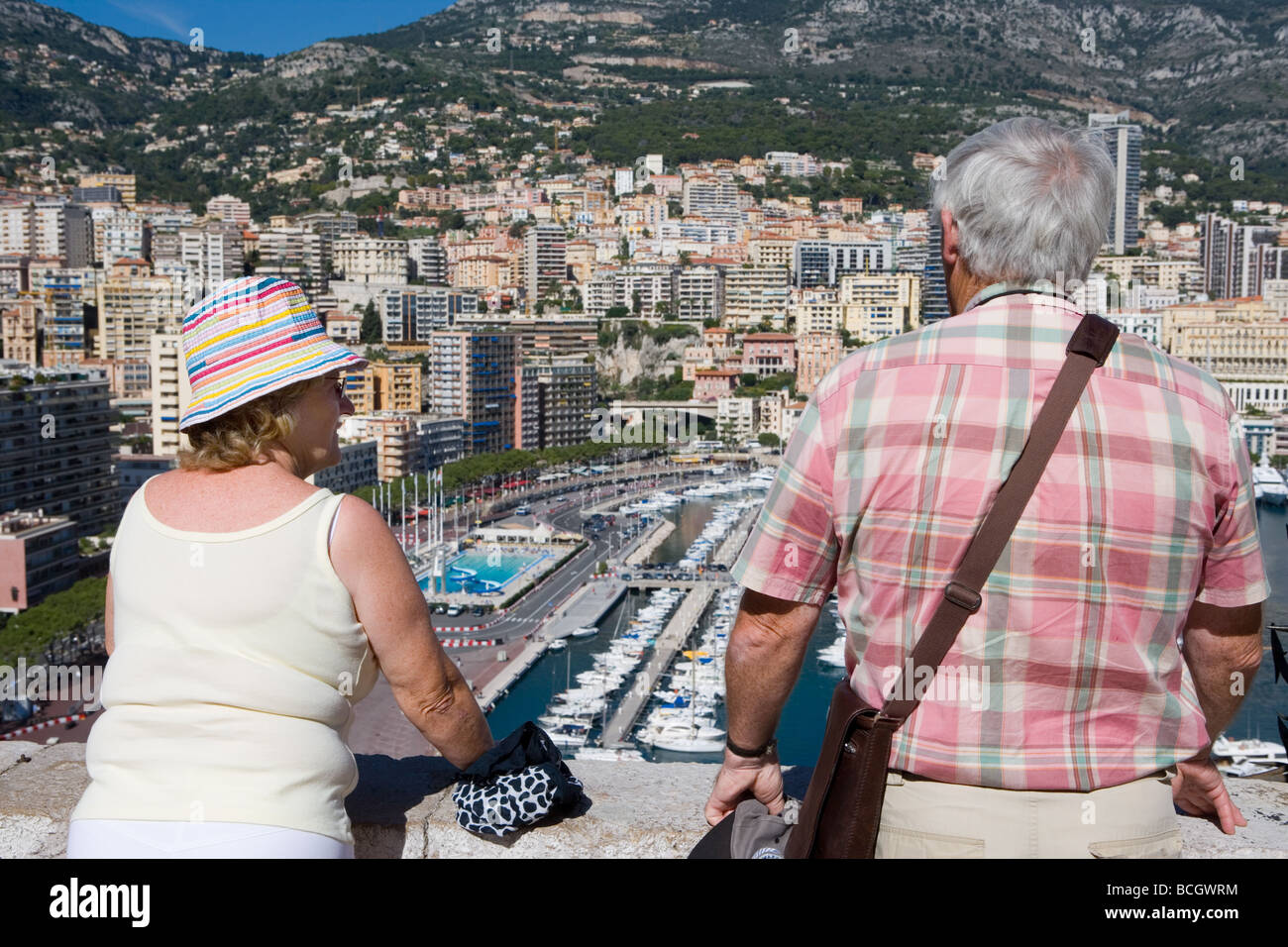 Tourists viewing Port de Monaco Monte Carlo Stock Photo