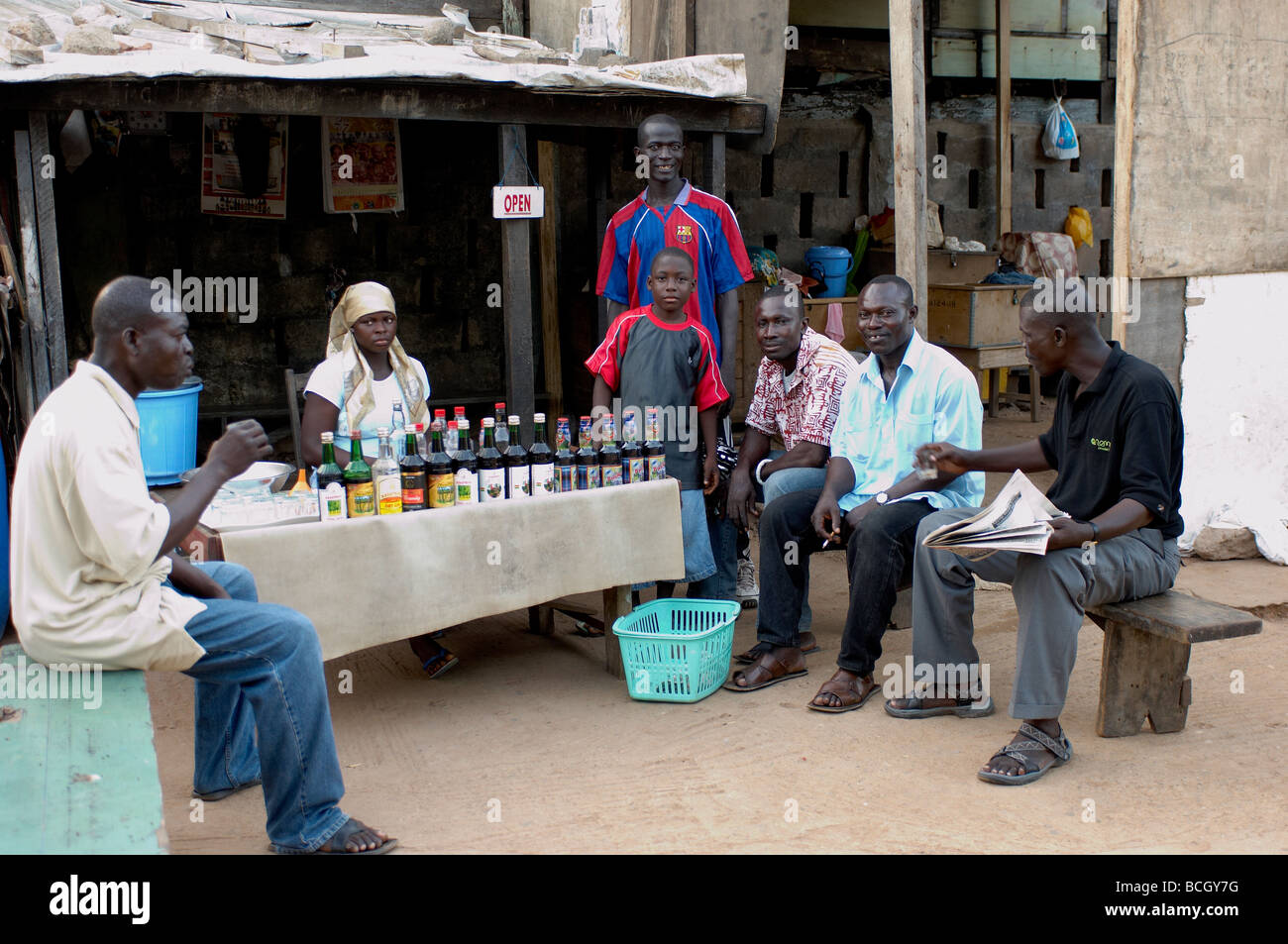 Men sitting at outdoor bar in Accra Ghana Stock Photo Alamy