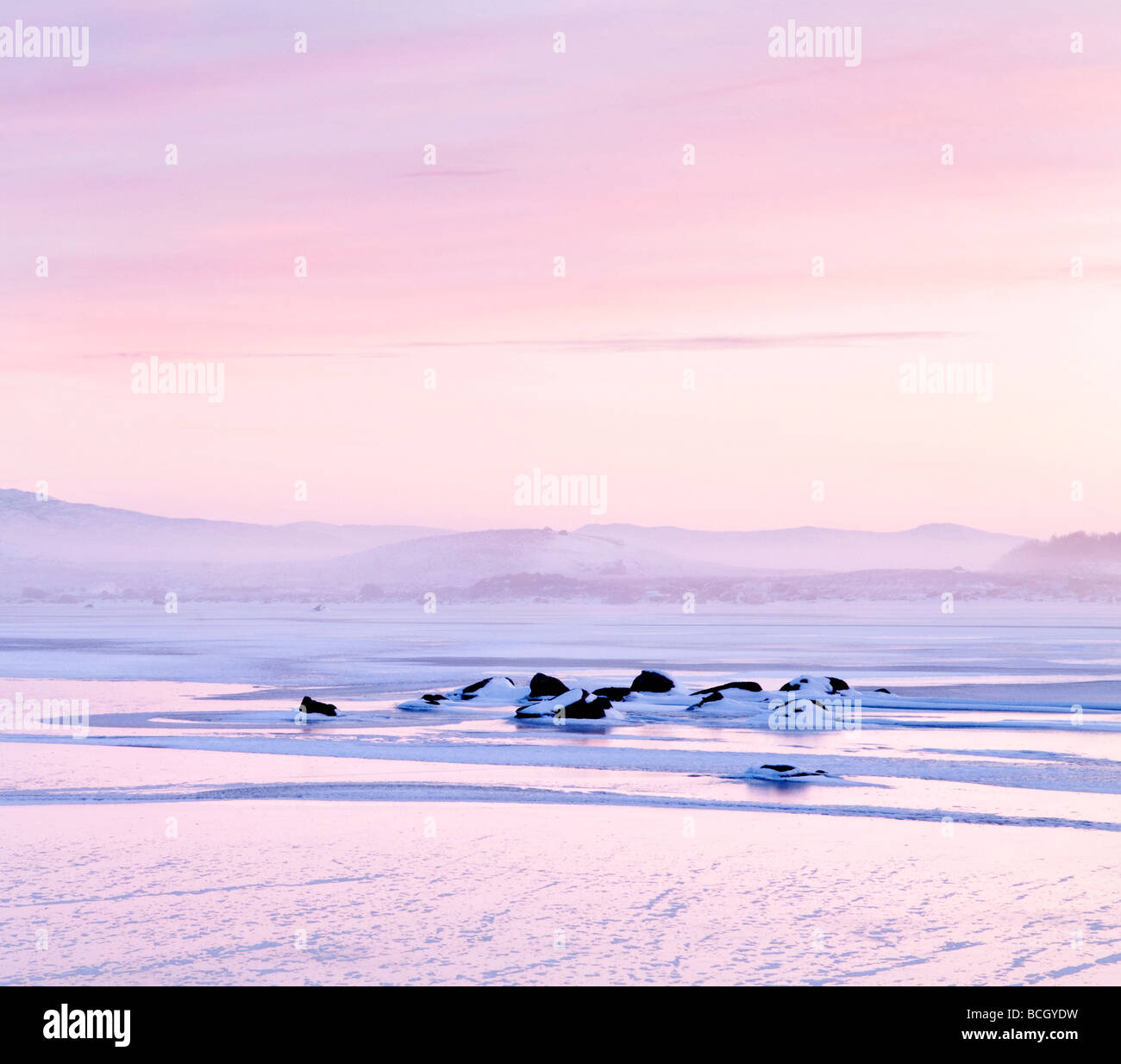 Pink sunrise on Loch Ba, Glencoe, Scotland, UK Stock Photo