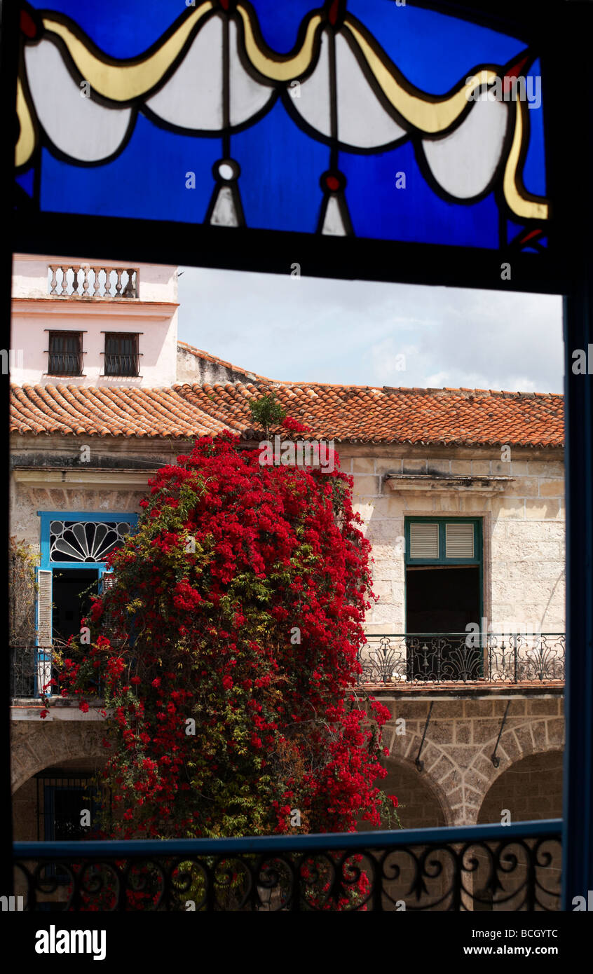 view of building opposite from stain glassed windows of El Patio restaurant in Plaza de la Catedral at Havana, Cuba, West Indies, Caribbean Stock Photo