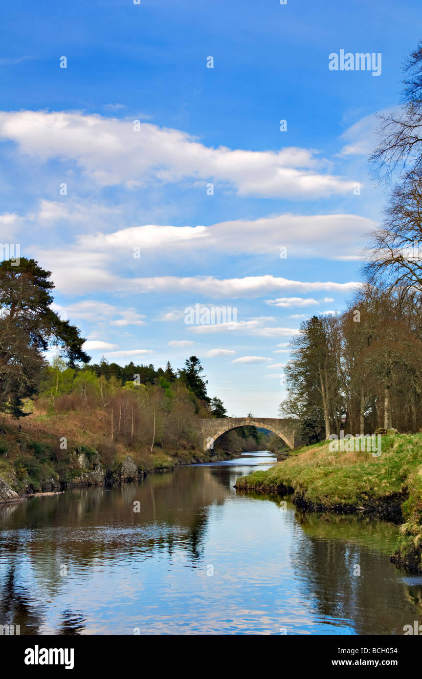 The River Carron, which many anglers use for fishing, taken on a fine spring evening with the bridge at Ardgay in Scotland. Stock Photo
