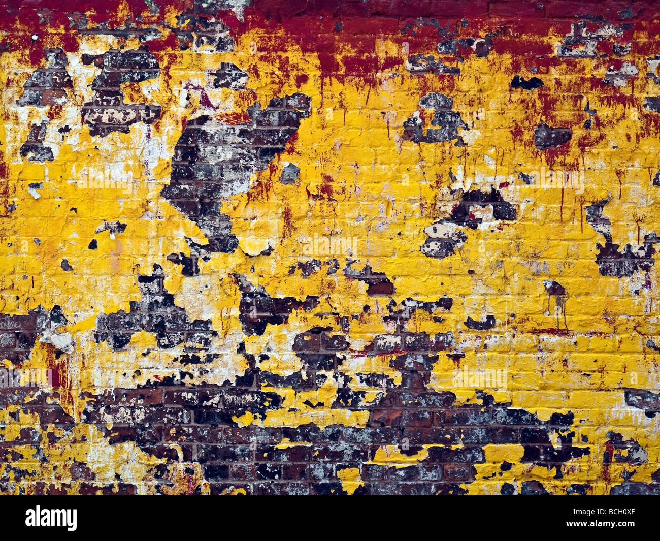 A old building wall with fading and chipping paint in New York City