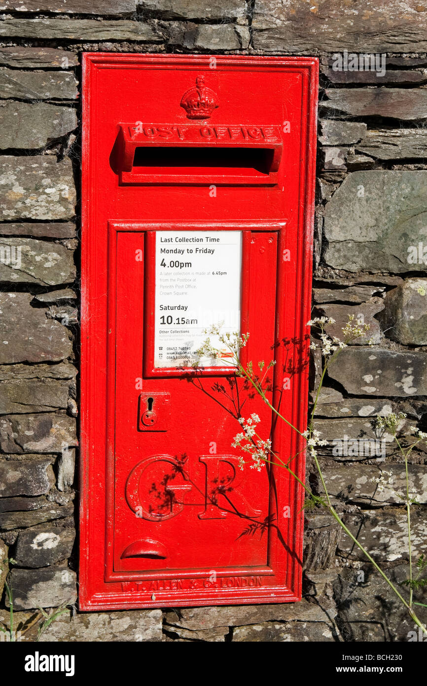 A red pillarbox in a wall, UK Stock Photo Alamy