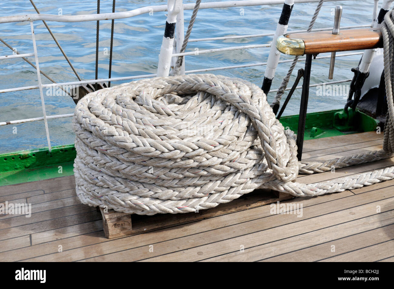 Spool of braided line on deck of sailing ship Stock Photo