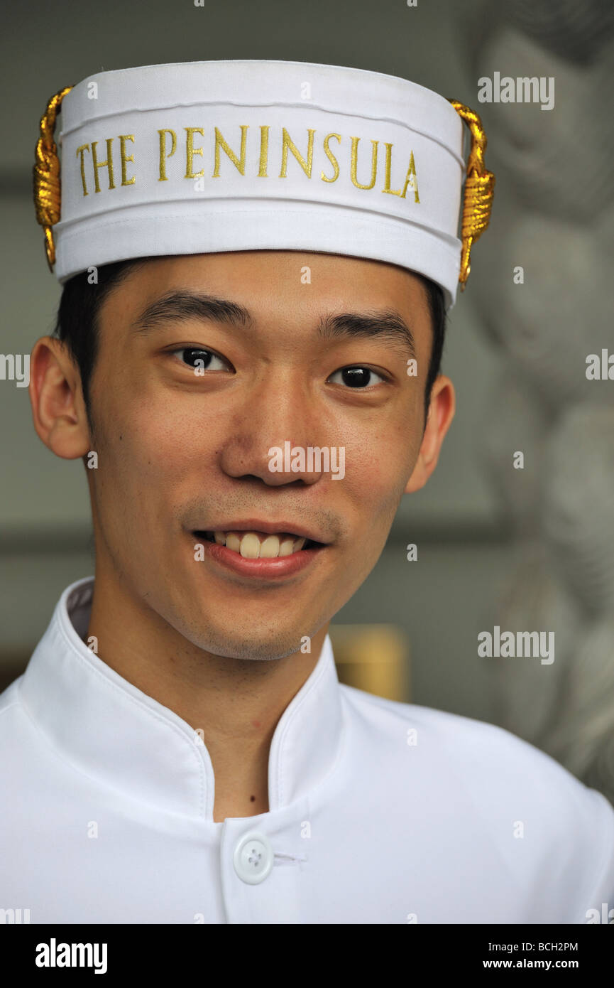 The Peninsula Hotel Hong Kong 5 star luxury hotel doorman smiling
