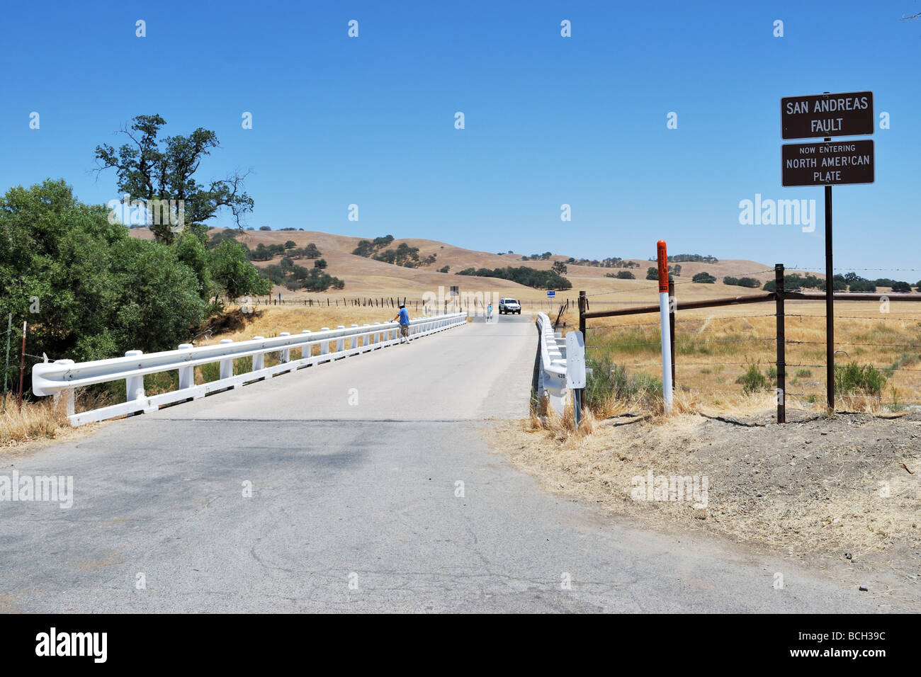This bridge near Parkfield, CA, crosses the San Andreas fault.  The bridge is twisted from previous earthquakes and movement. Stock Photo