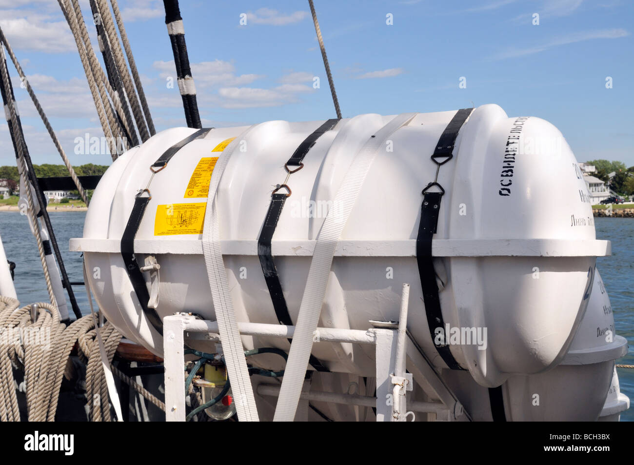 Inflatable lifeboat stored on deck of ship Stock Photo - Alamy