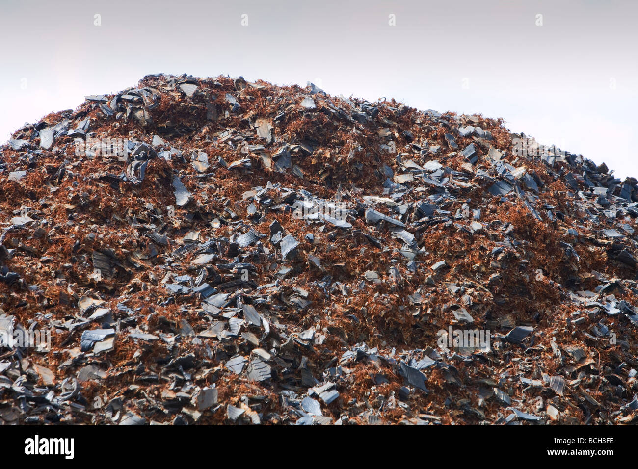 Used car tyres being cut up for burning as fuel in power stations This